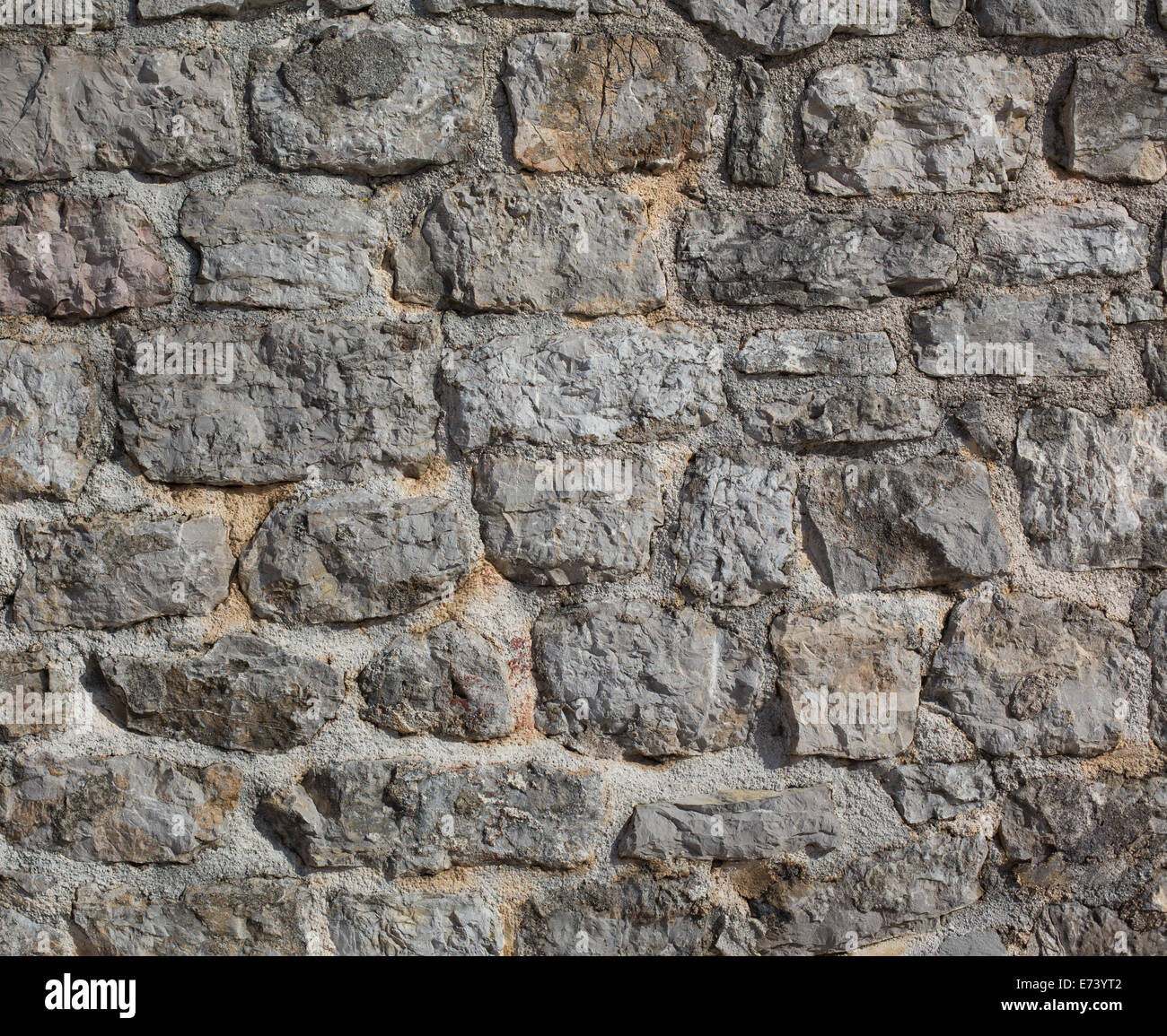 Old castle stone wall background Stock Photo