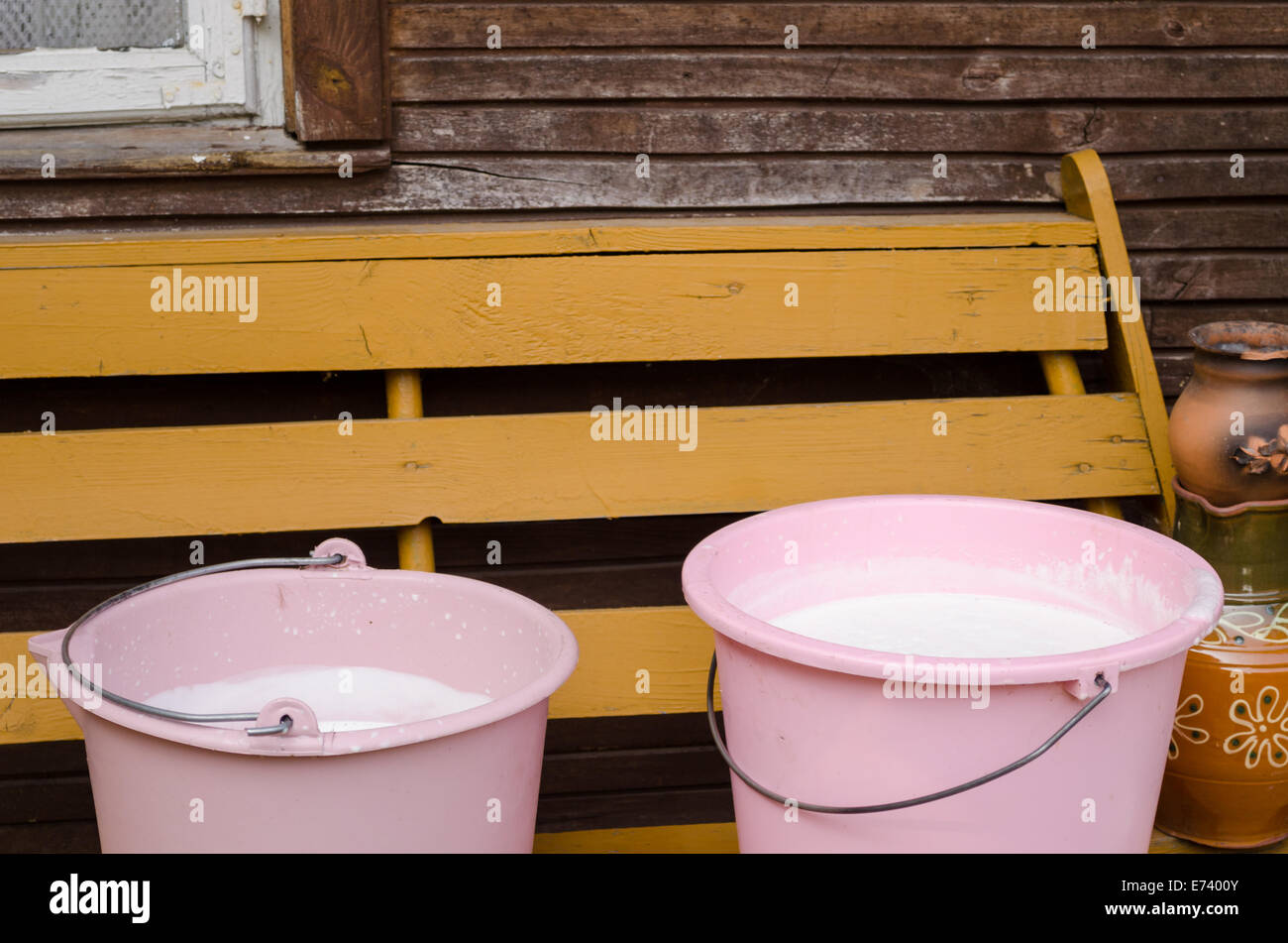 Milk pail bucket wooden hi-res stock photography and images - Alamy