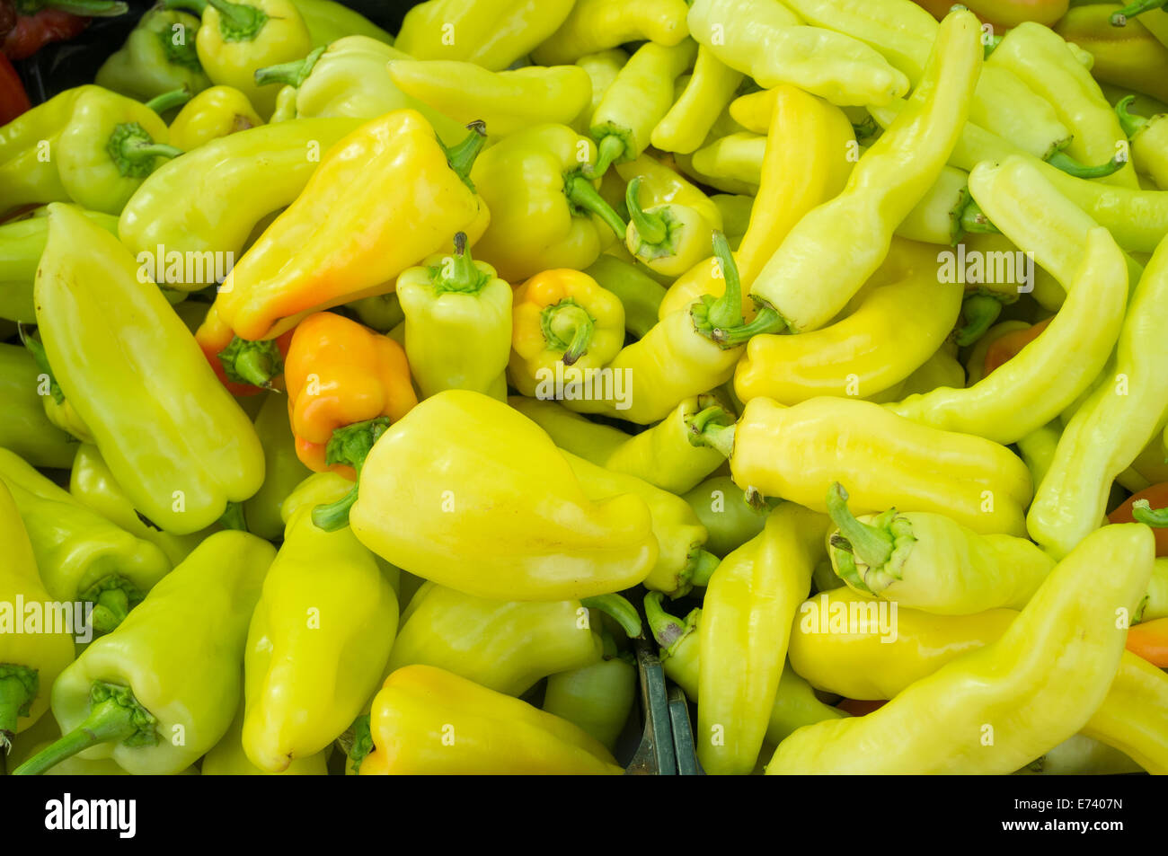 Full frame take of green peppers on display on a street market stall ...