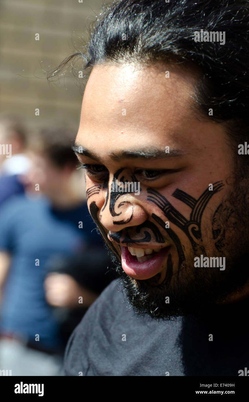 Maori man in warrior make-up promoting a show at the annual Festival Fringe in Edinburgh, Scotland. Stock Photo