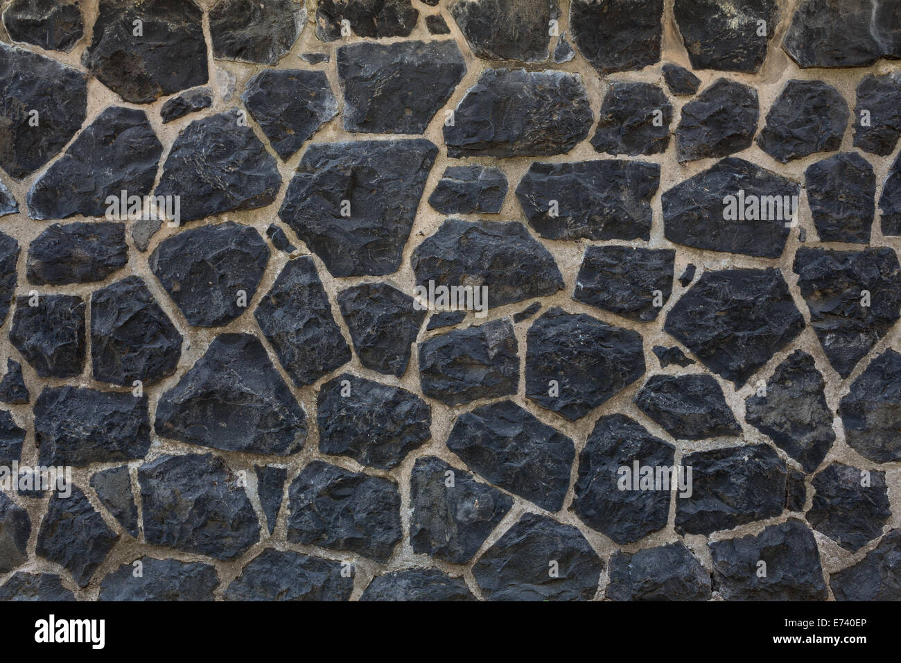 Dark stone wall background Stock Photo