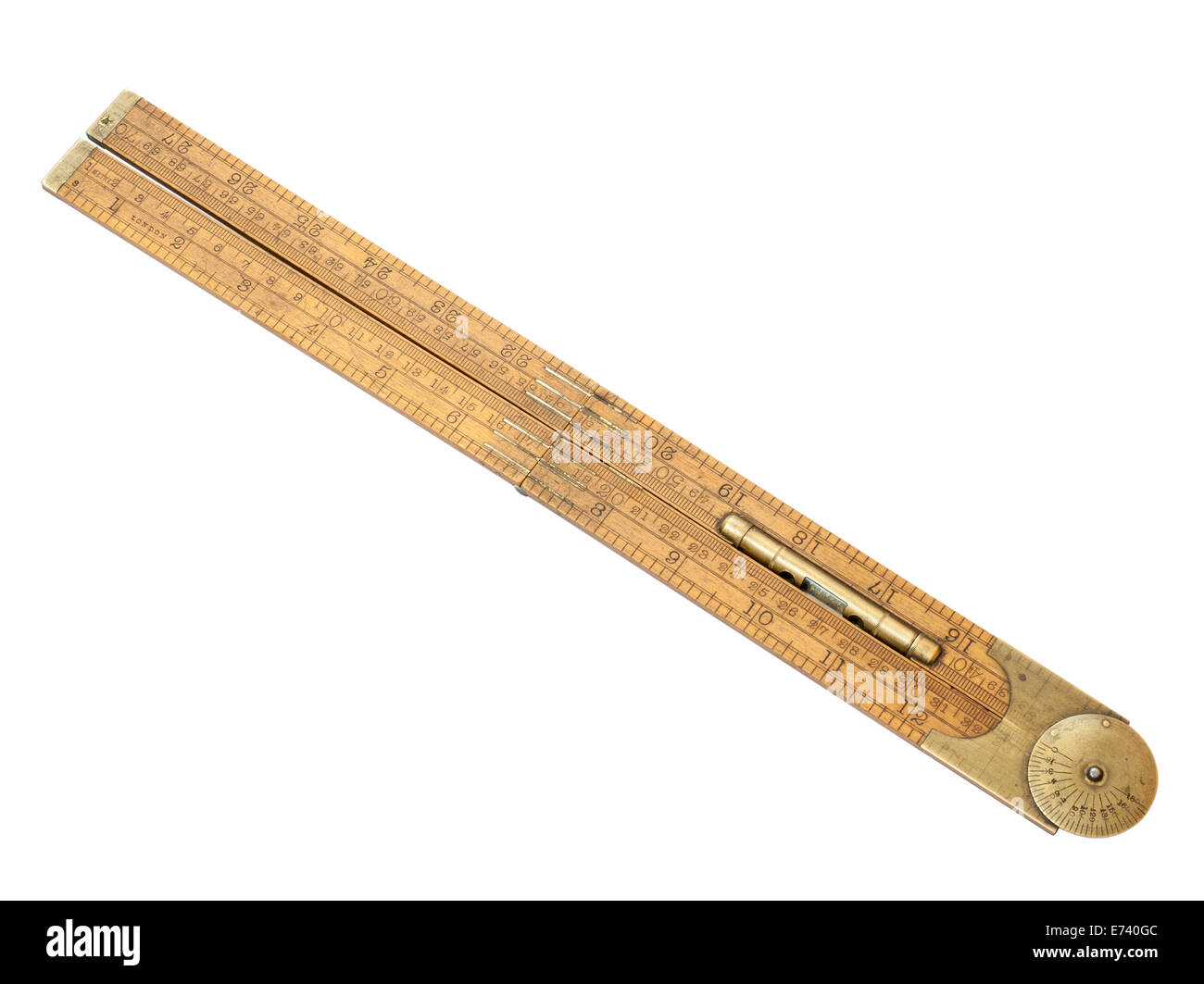 carpenter's rule of 19th century with brass level front view isolated on white with clipping path Stock Photo