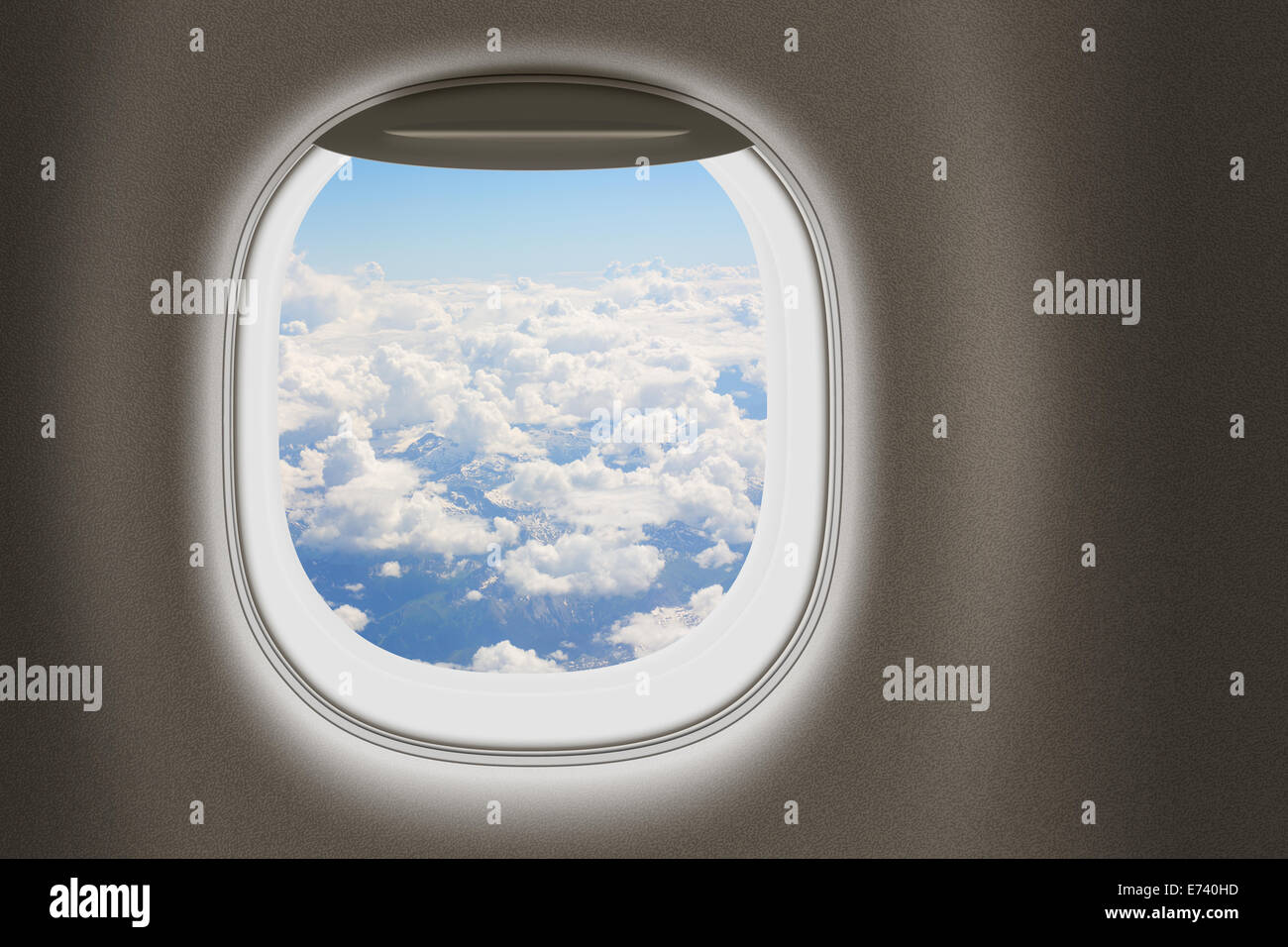 Airplane or jet window, travel and tourism concept. Stock Photo