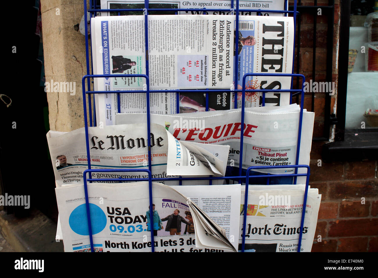 International newspapers on sale, Stratford-upon-Avon, UK Stock Photo