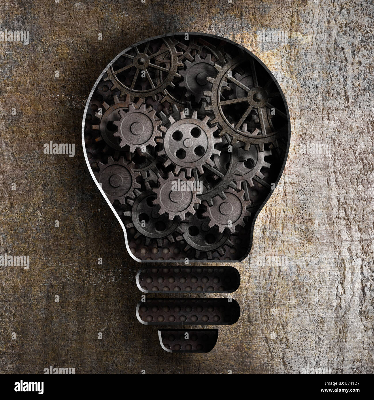 lighting bulb business concept with working gears and cogs in rusty metal background Stock Photo