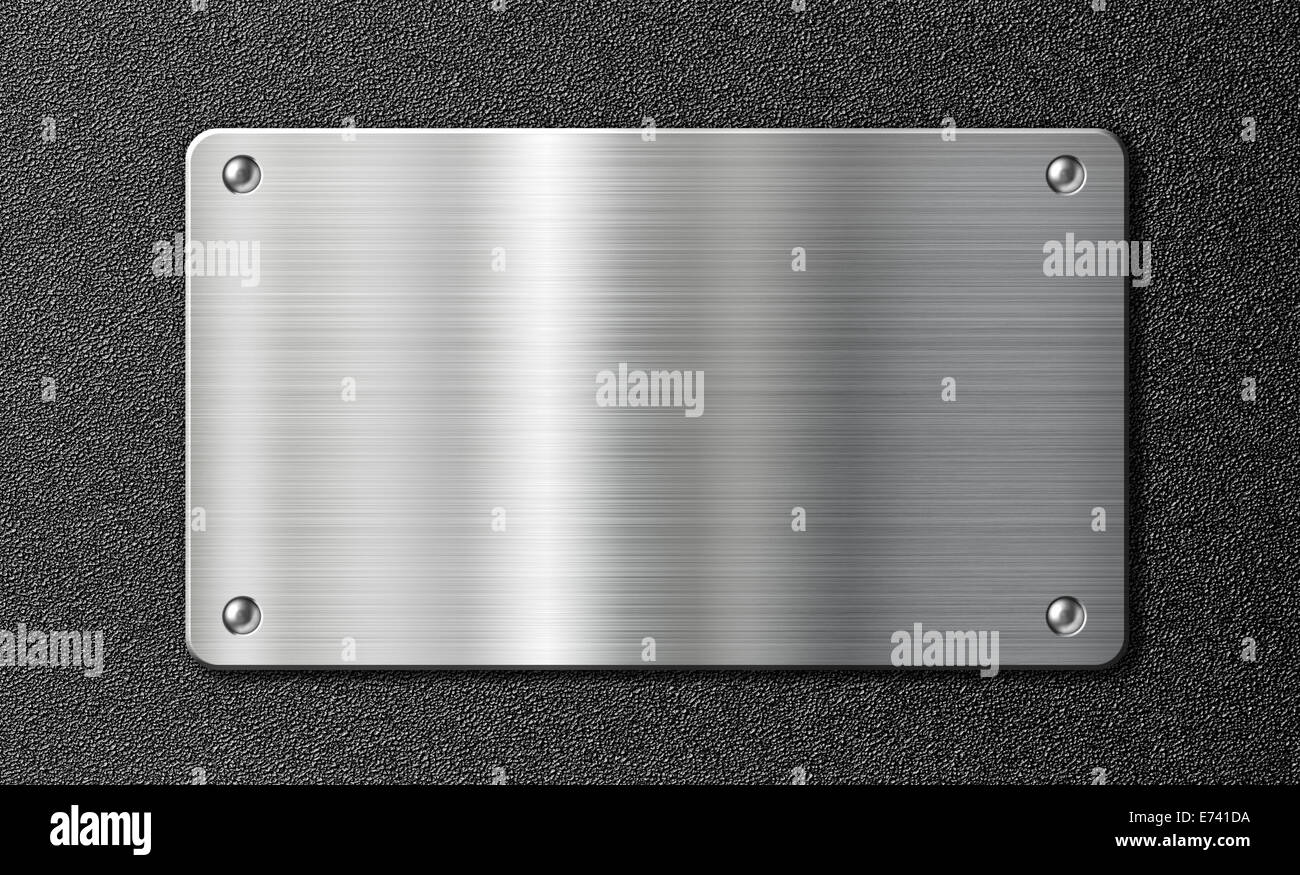 stainless steel metal plate over black texture Stock Photo
