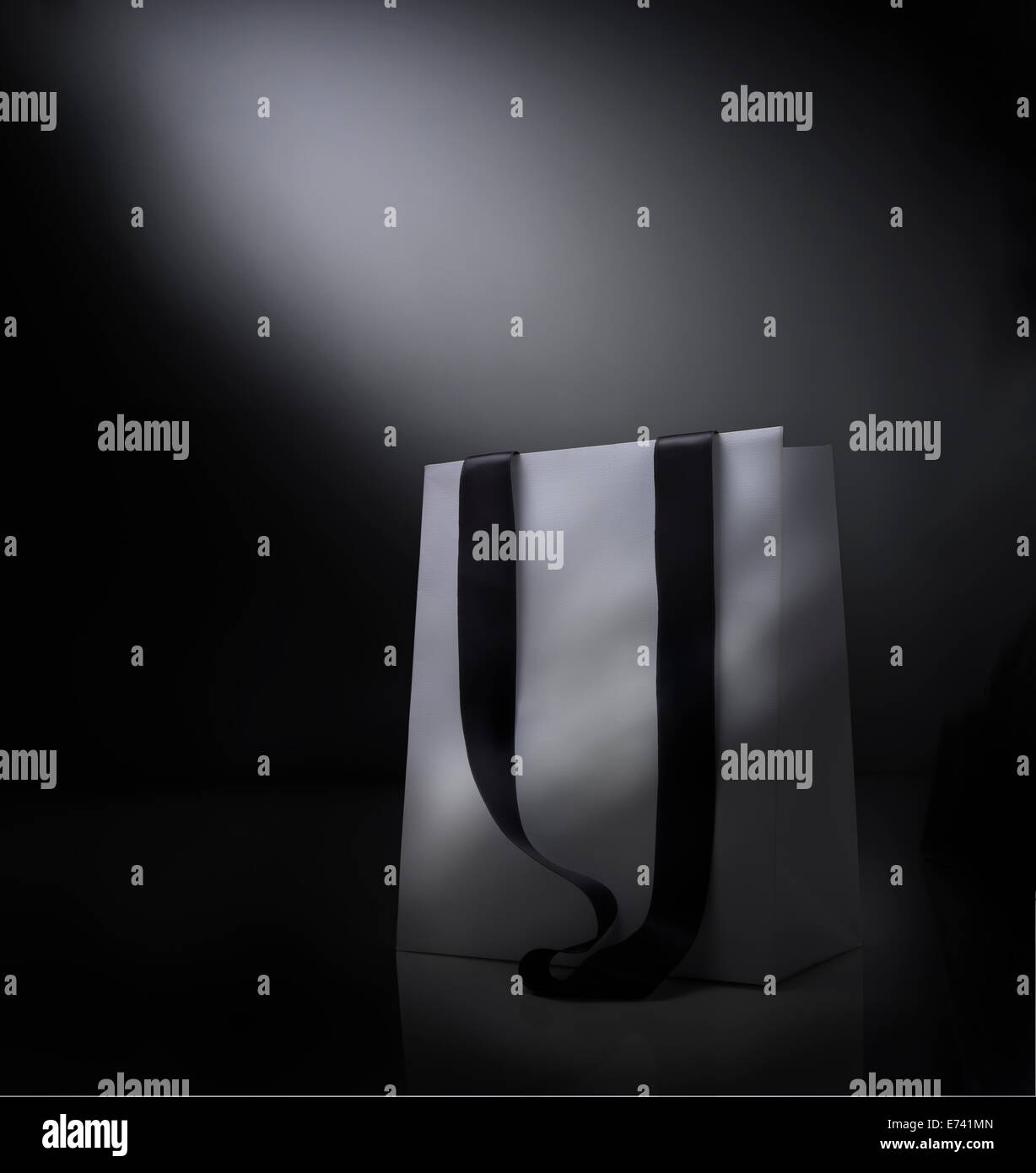 Fantasy shopping bag against  black background Stock Photo