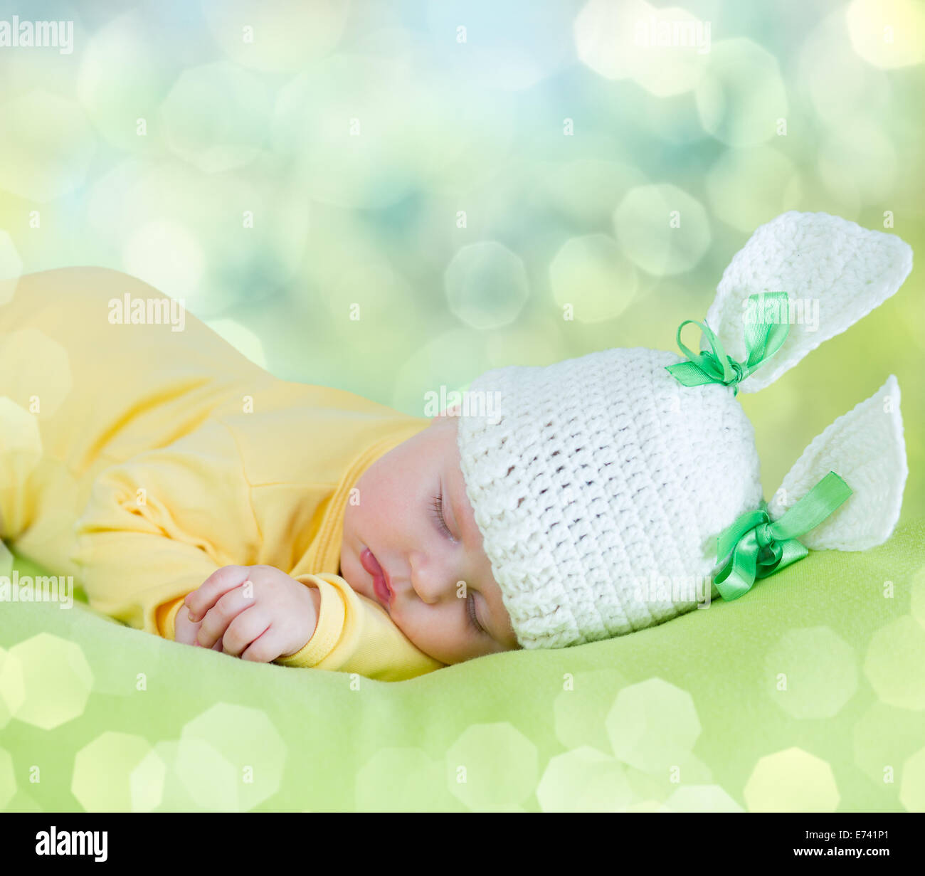 sleeping baby closeup portrait in hare or rabbit hat copyspace Stock Photo