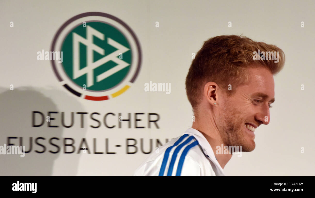 National player André Schuerrle arrives for a press conference at the ...