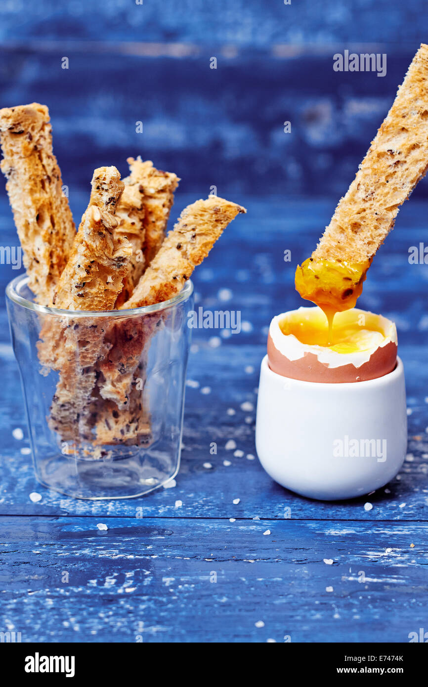 Toast soldiers in boiled egg Stock Photo Alamy