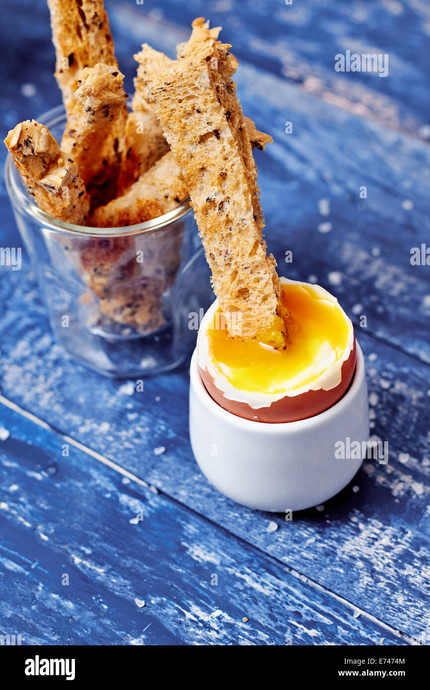 Toast soldiers in boiled egg Stock Photo Alamy