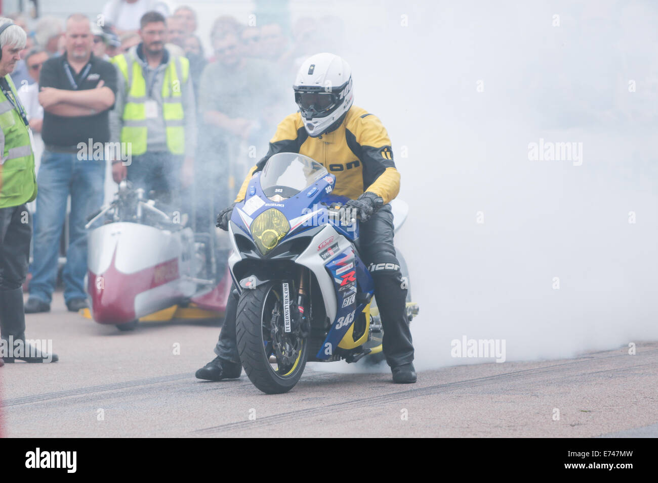This is Paul Furlong riding a Suzuki GSXR 1000 K7 at the Brighton National Speed Trials organised by the Brighton & Hove Motor Club held annually at Madeira Drive, Brighton Seafront, Brighton, East Sussex, UK. 6th September 2014 Stock Photo