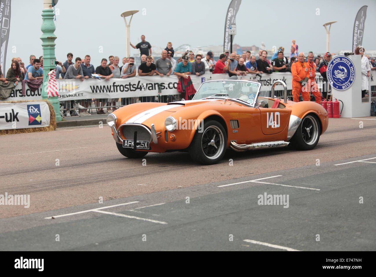 This is John Davey driving a Pilgrim Sumo AC Cobra Replica racing from the start line at the Brighton and Hove National Speed Trials an annual event at Madeira Drive, Brighton Seafront, Brighton, East Sussex, UK. 6th September 2014 Stock Photo