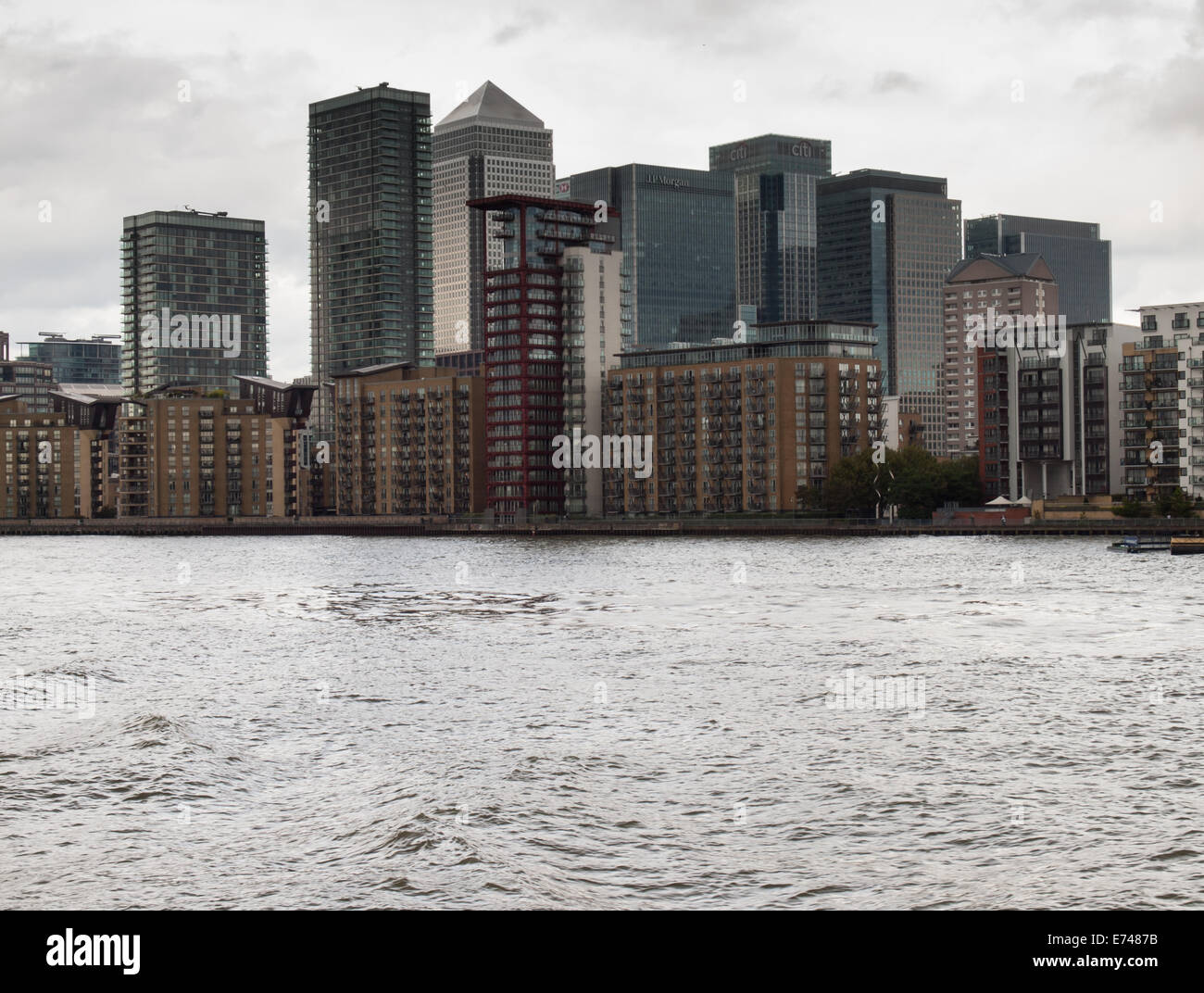 london docklands with canary wharf and canada tower viewed from the river thames Stock Photo