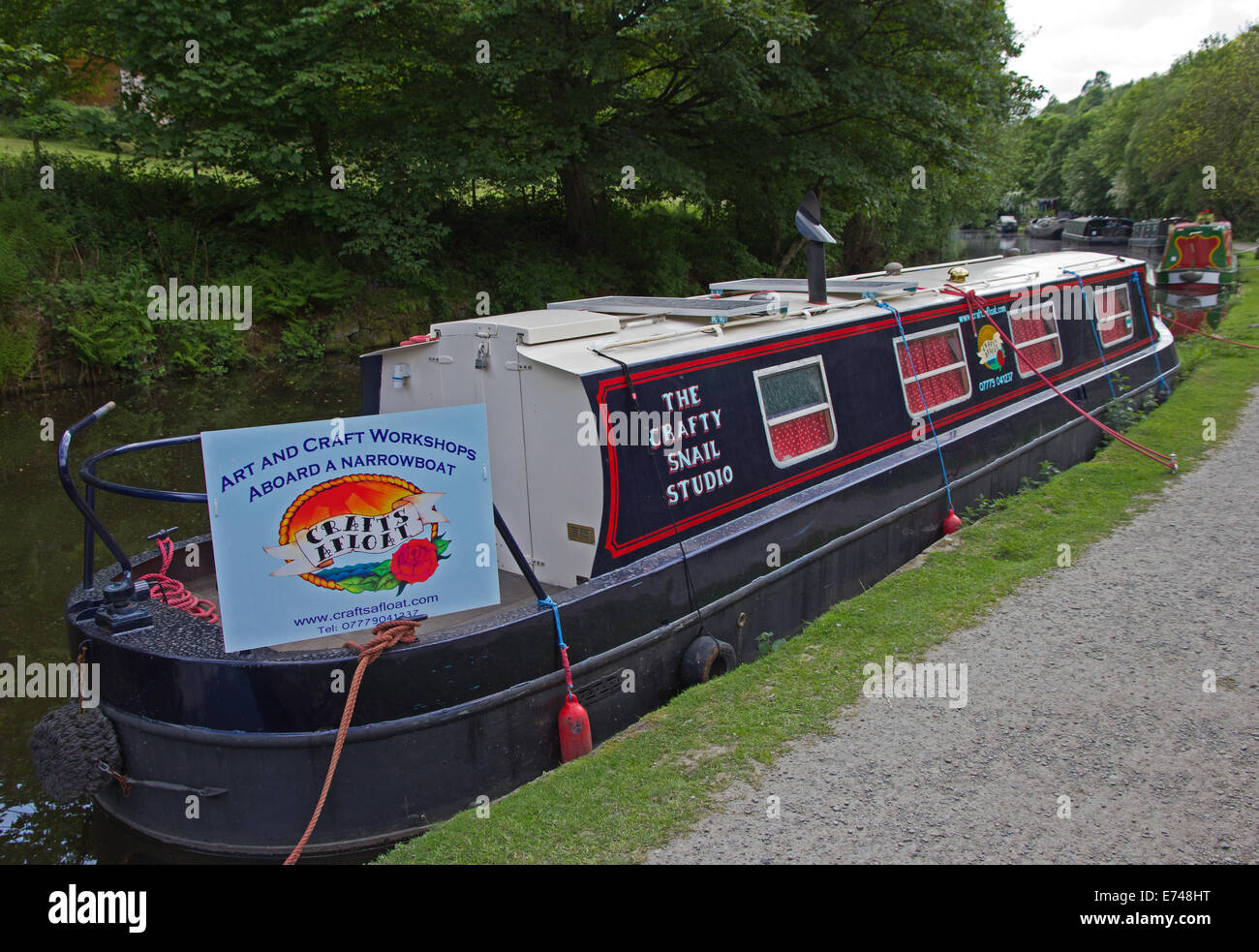 Narrowboat converted into artist's studio on Rochdale Canal at Hebden Bridge Stock Photo