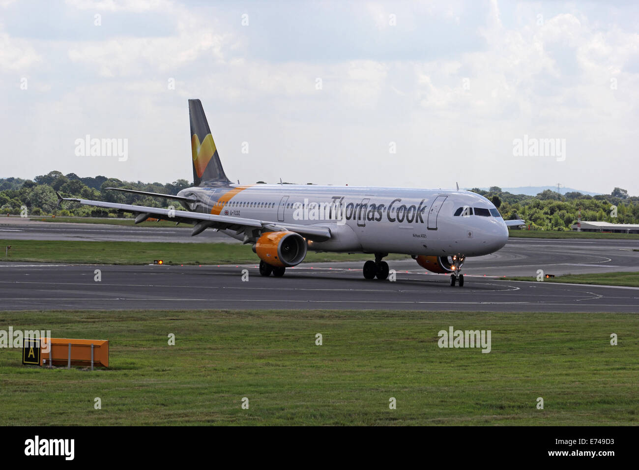 Thomas Cook Airlines Airbus A321-211 taxiing at Manchester International Airport Stock Photo