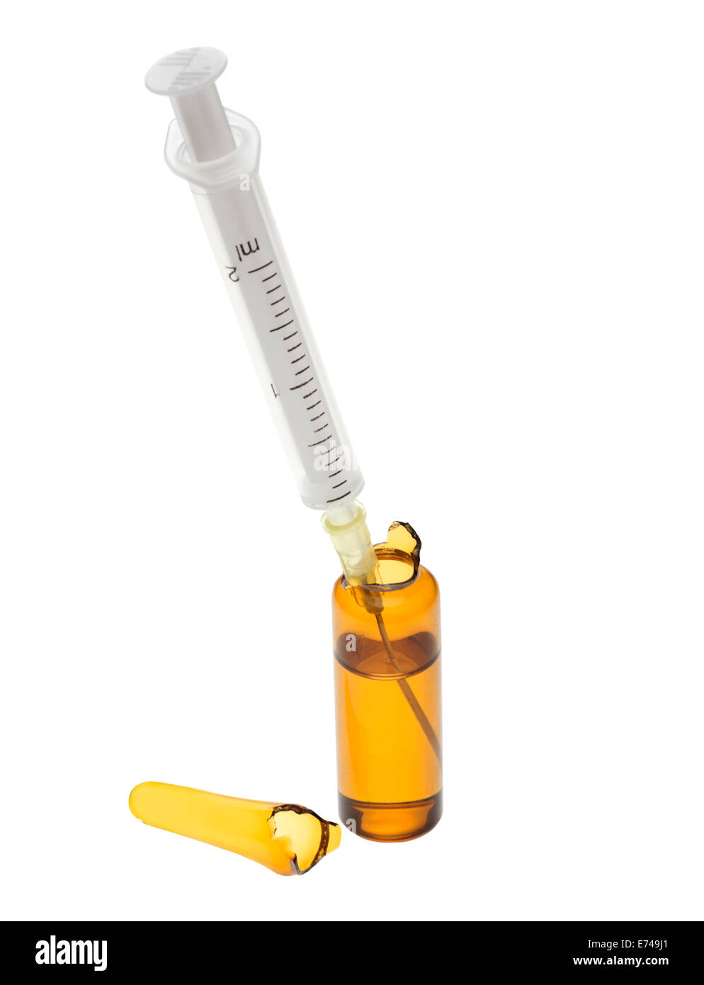 Broken Ampoule and Syringe on a white background Stock Photo
