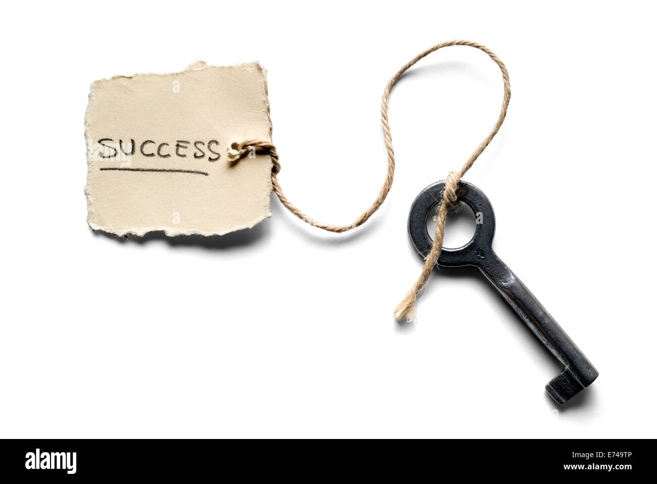 old key to success concept with label or tag Stock Photo