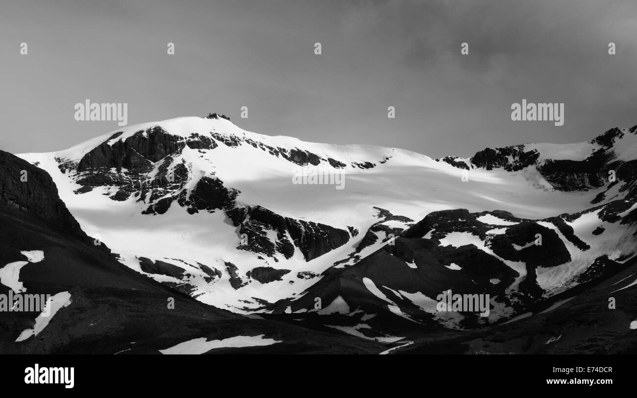 Jagged, snow covered mountains in the Valle del Silencio in Torres del Paine National Park, Patagonia, Chile. Black and white. Stock Photo