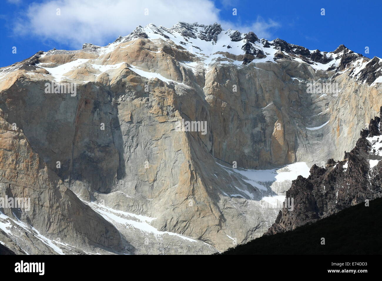 The sheer rock faces of the mountains in Torres del Paine National Park, Chile. Stock Photo