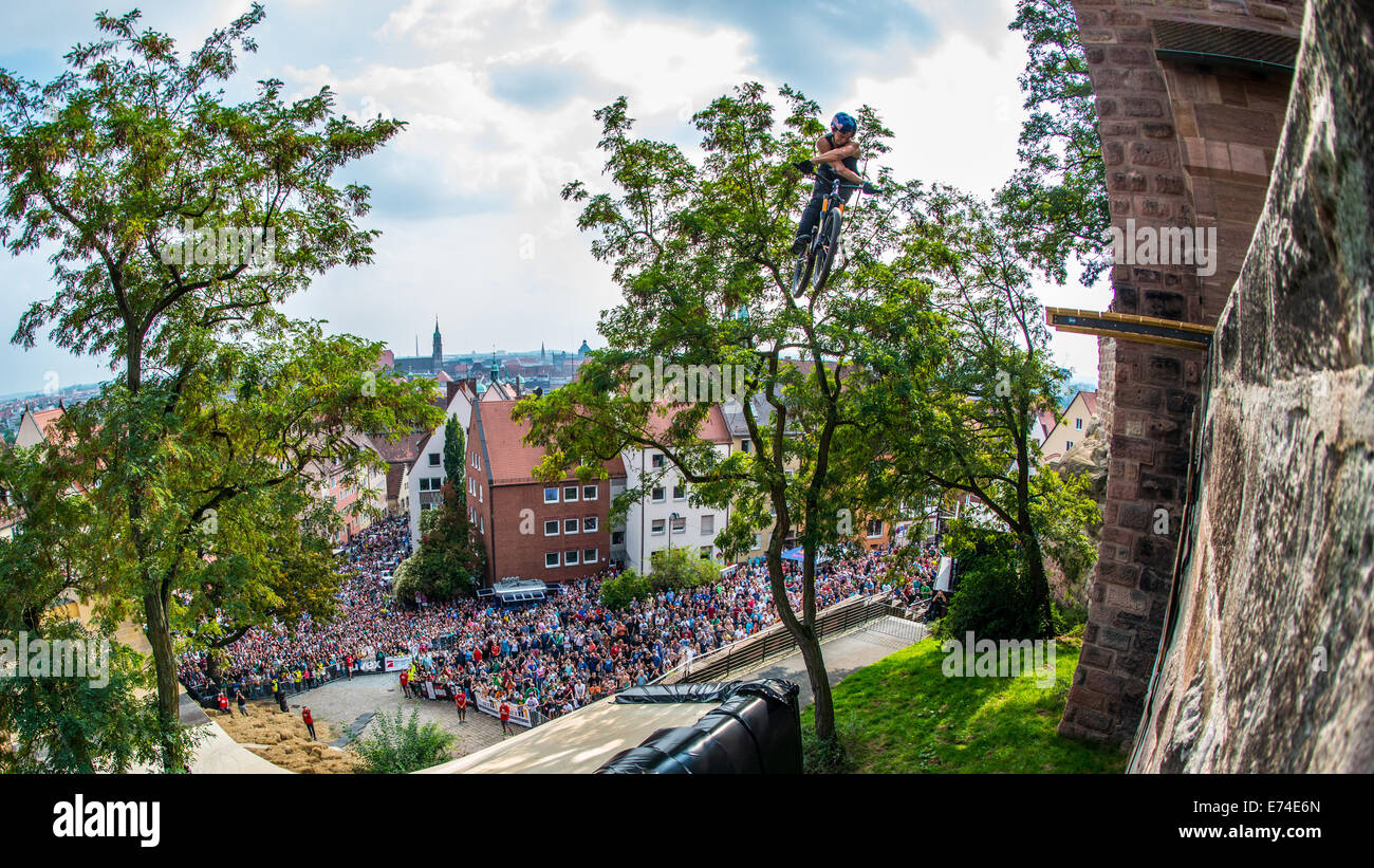 Nuremberg, Germany. 06th Sep, 2014. HANDOUT - Polish mountain biker Szymon Godziek shows a 360 X-Up during the Red Bull Desitrict Ride 2014 in Nuremberg, Germany, 06 September 2014. Around 62 000 visitors follow the mountain bike event. Photo: Marc Mueller/Red Bull Media House dpa/lby/dpa/Alamy Live News Stock Photo