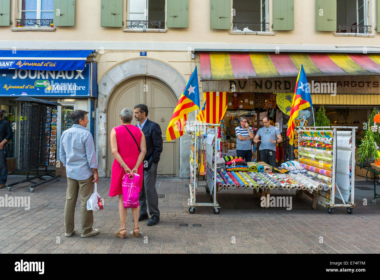 Perpignan, France, People Talking on Town Square, French Shops, Local Catalonia Flag, Local Fabric Shop Stock Photo