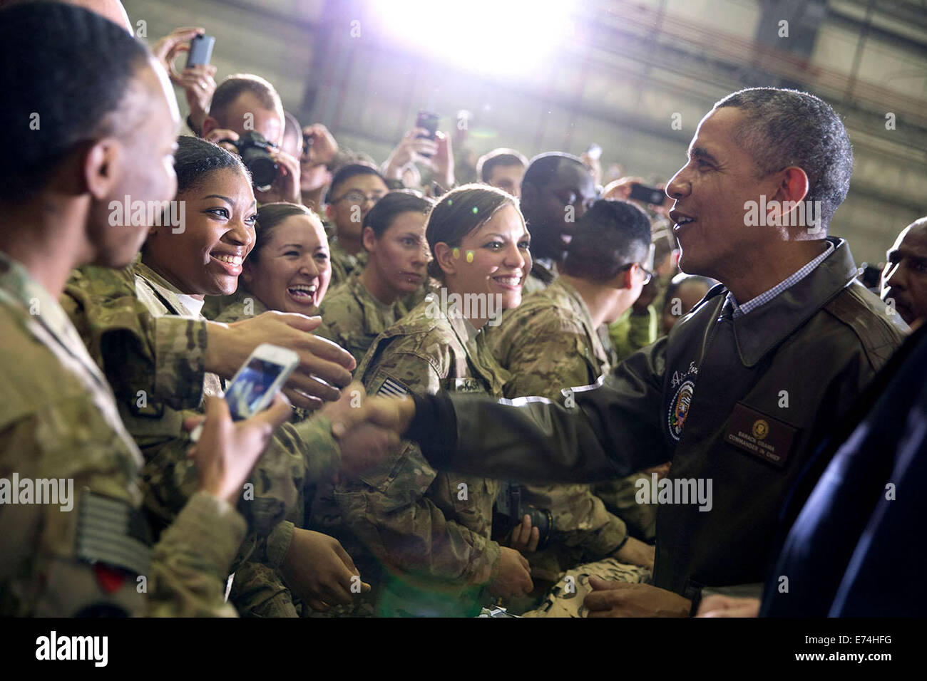 President Barack Obama shakes hands with U.S. troops at Bagram Airfield, Afghanistan, Sunday, May 25, 2014. Stock Photo