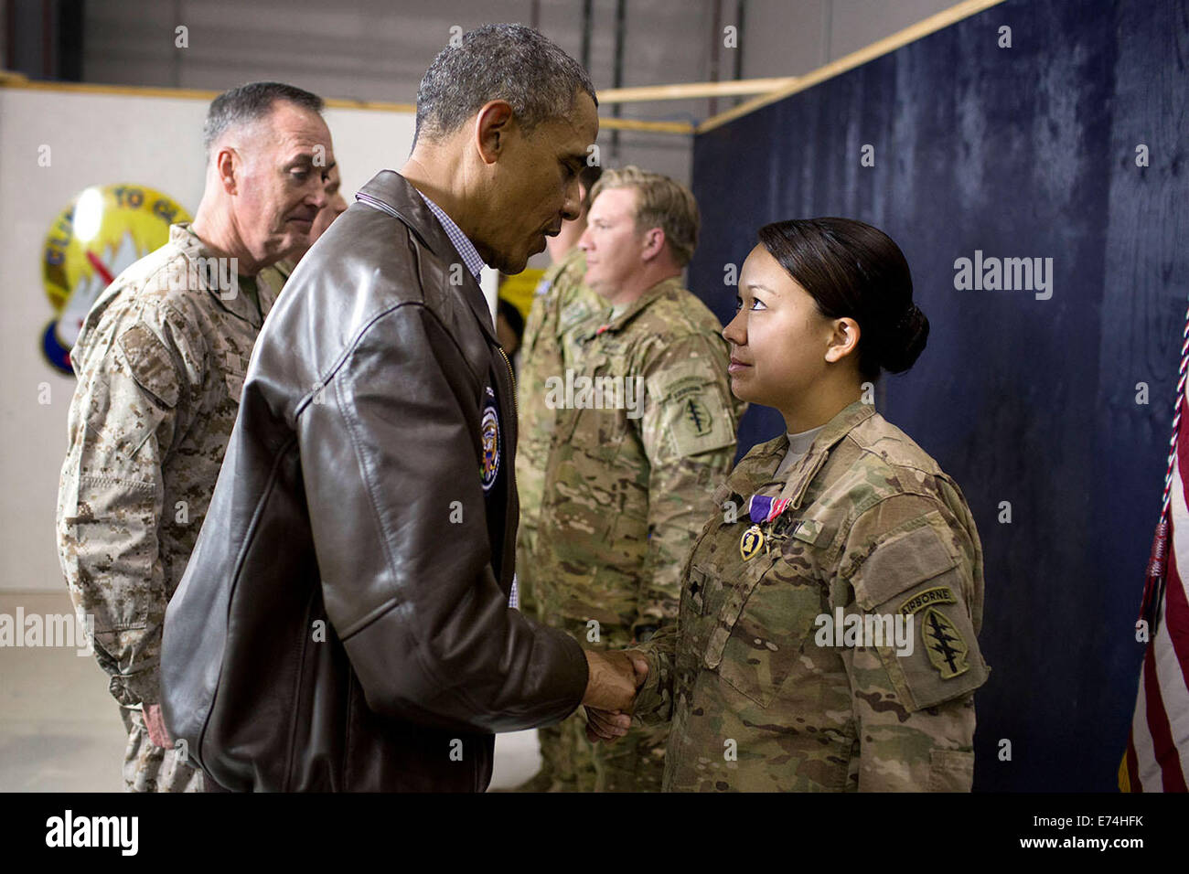 President Barack Obama awards medals to U.S. troops following his remarks at Bagram Airfield, Afghanistan, Sunday, May 25, 2014. Stock Photo