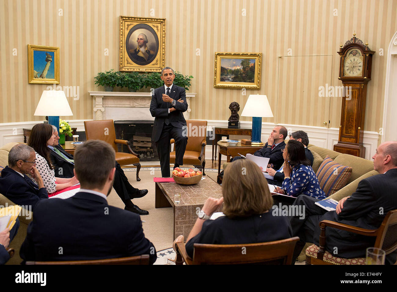 President Barack Obama meets with senior advisors in the Oval Office, May 27, 2014. Stock Photo
