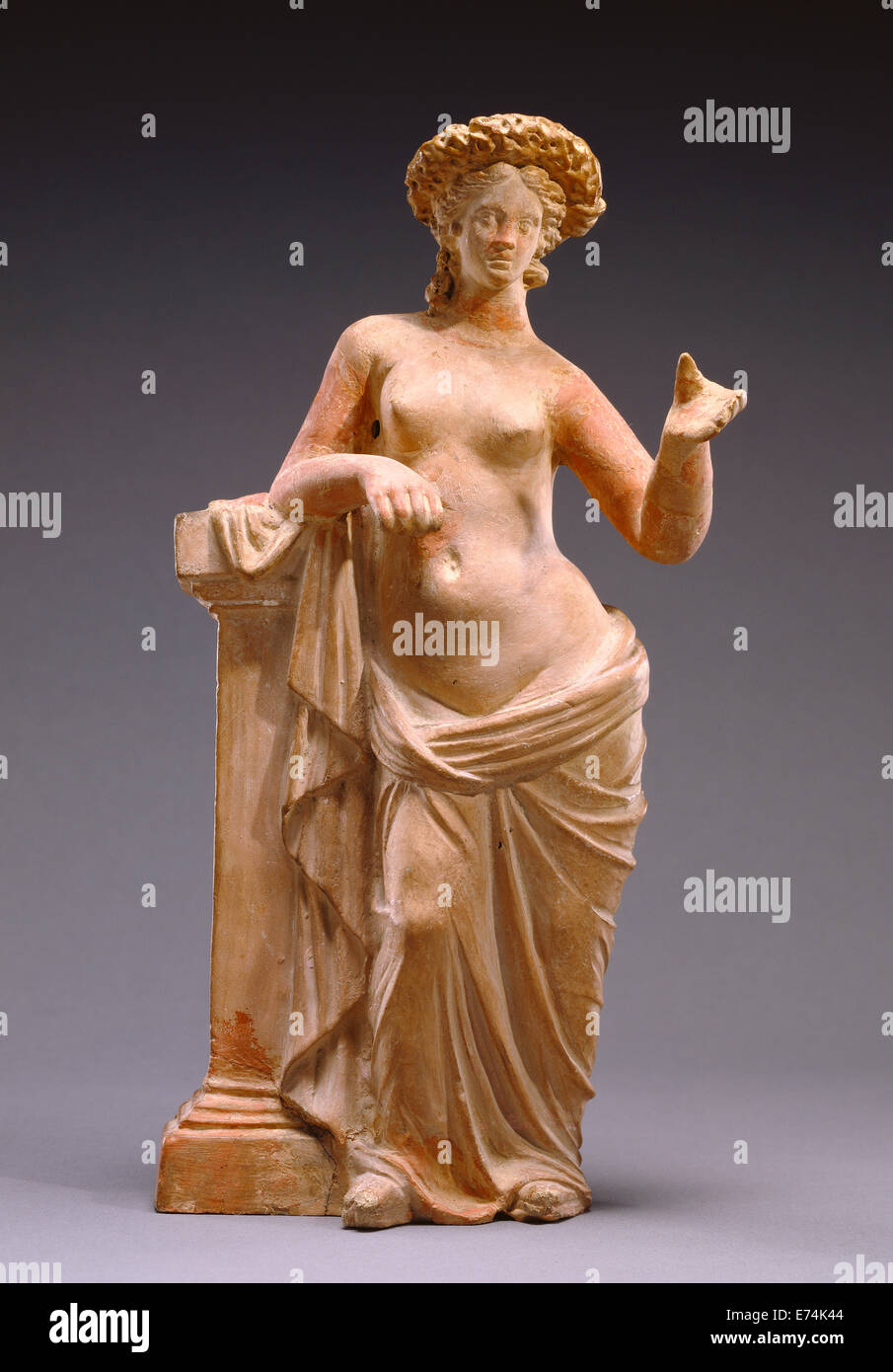 Statuette of Aphrodite Leaning on a Pillar; Unknown; Tanagra, Greece, Europe; 250 - 200 B.C.; Terracotta with polychromy; Object Stock Photo