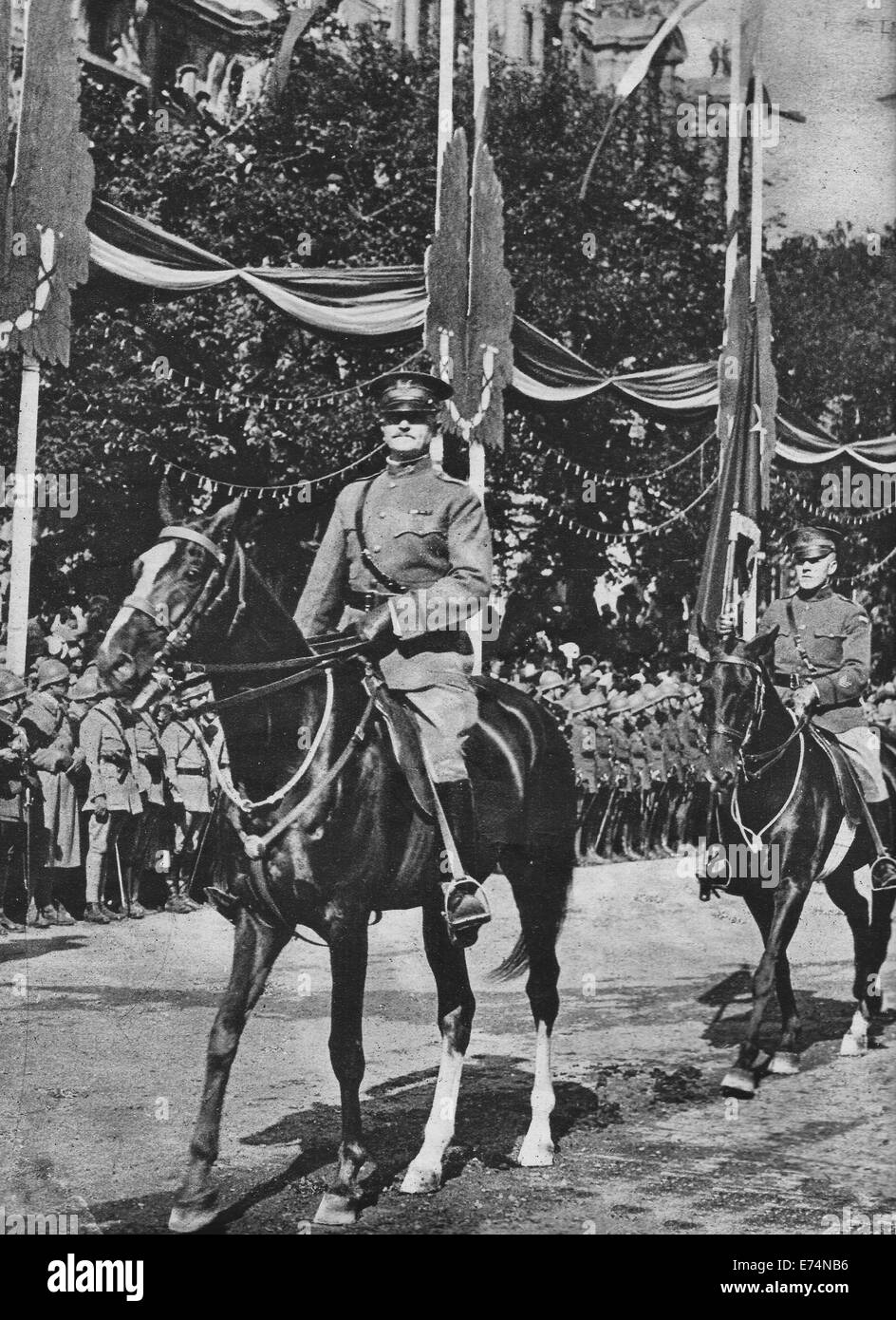 General Pershing at Head of American Troops on Bastille Day in Paris, 1919, with orderly carrying flag denoting General's rank Stock Photo