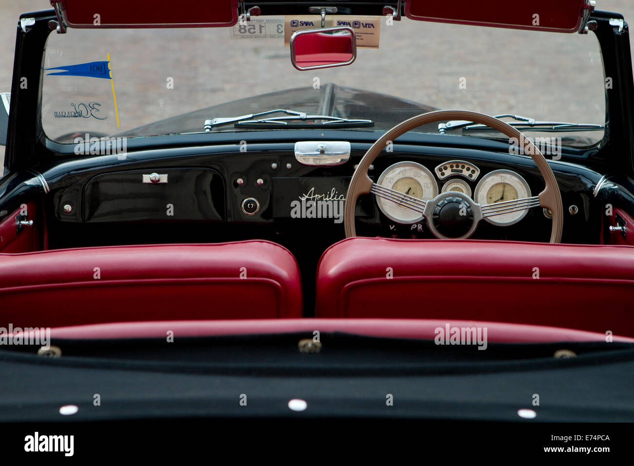 Torino, Italy. 6th September 2014. The cockpit of a 1947 Lancia Aprilia Cabriolet. Collectors of historical cars met in Torino for a car elegance competition. Stock Photo