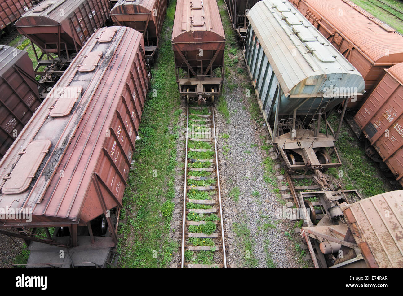 Freight Station with many old wagons of USSR on rails Stock Photo
