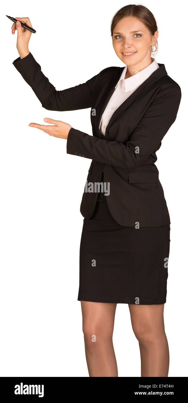 Beautiful girl in business suit holding pen and writing Stock Photo - Alamy