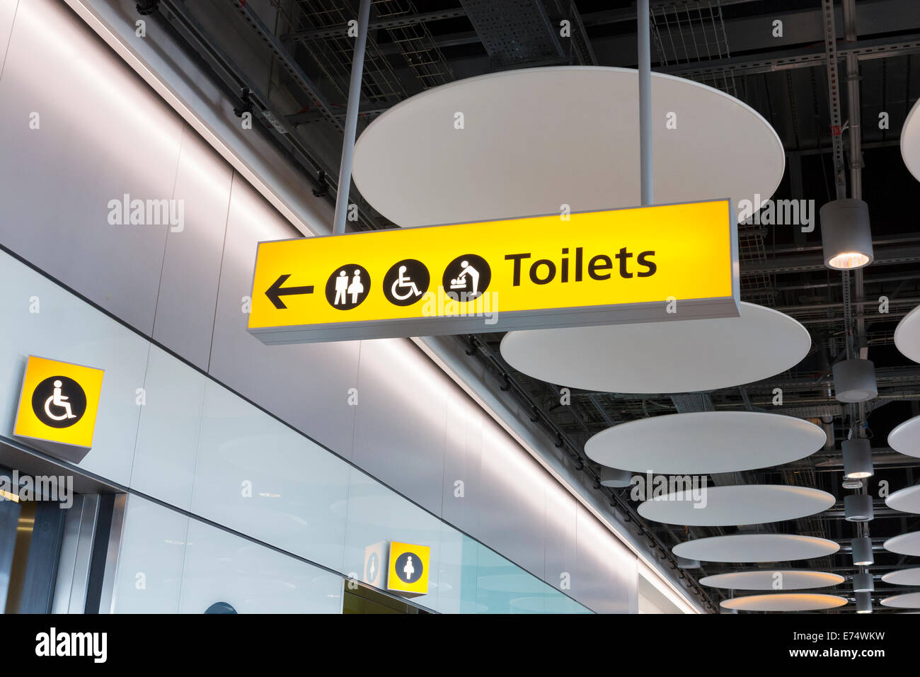 Toilet sign at airport, UK Stock Photo