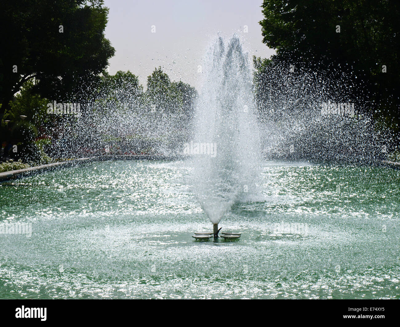Fountain in a park Stock Photo - Alamy
