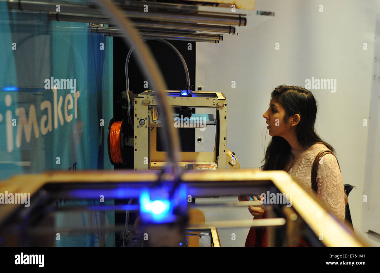 3D printers on display during the Paris 3D printshow, an event dedicated to this revolutionary new technology. Stock Photo
