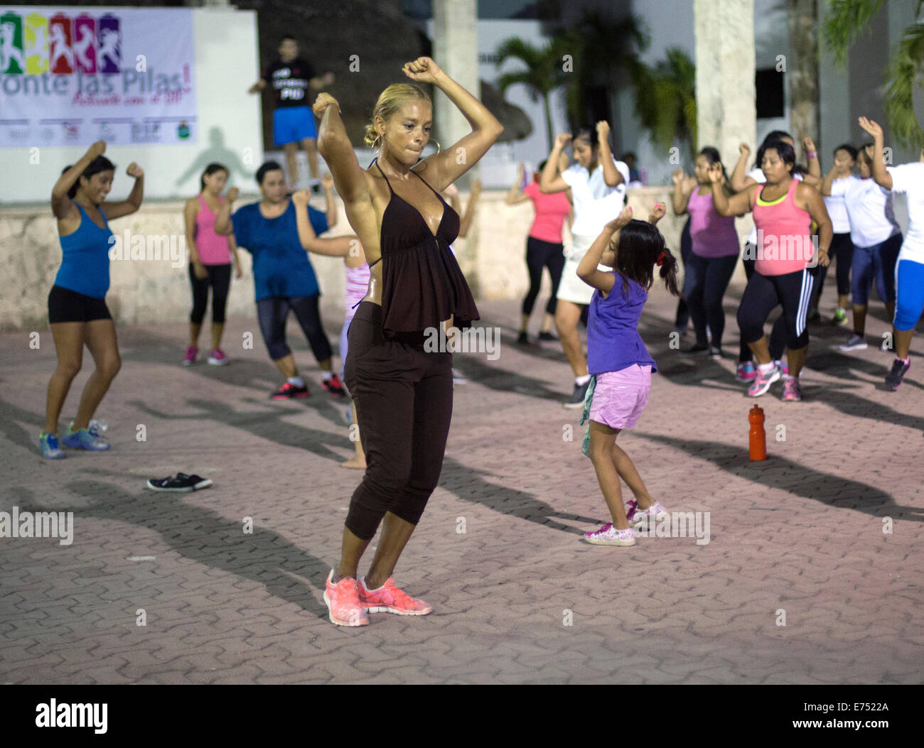 Outdoor zumba class in Mexico square with sweaty woman Stock Photo