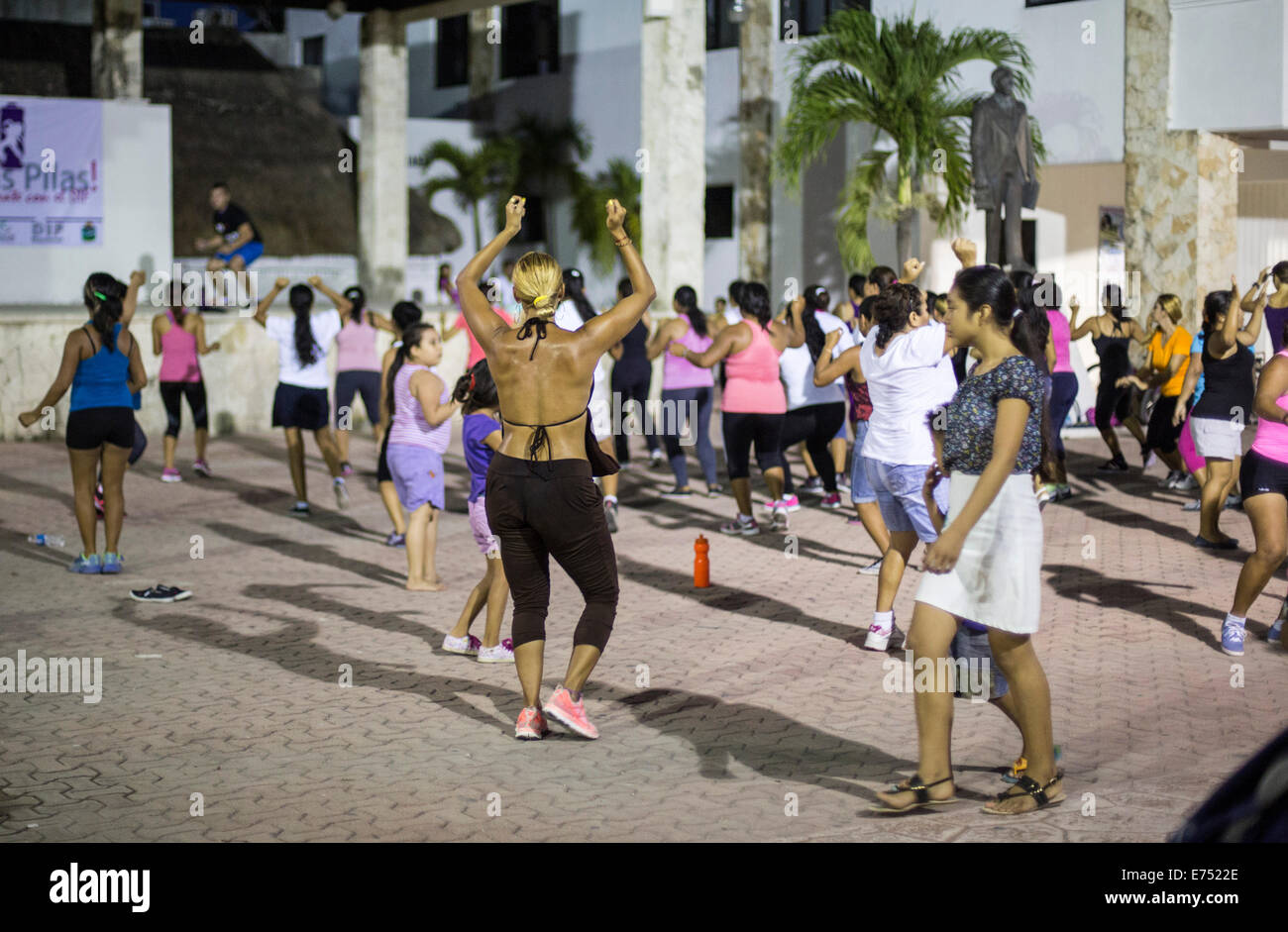 Outdoor zumba class in Mexico square with sweaty woman Stock Photo