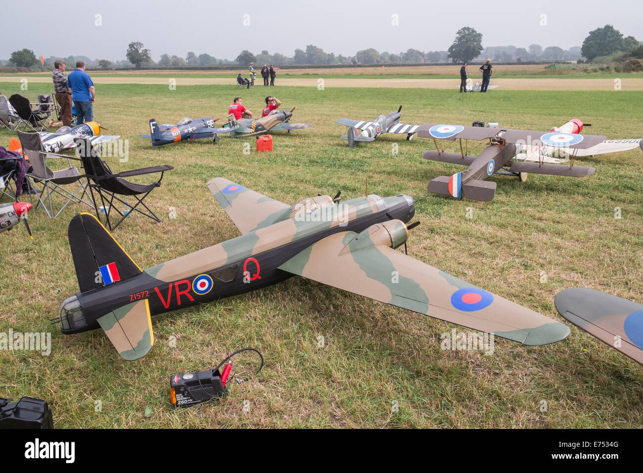 Remote controlled model plane enthusiasts at battle reenactment event, Leicestershire, England Stock Photo