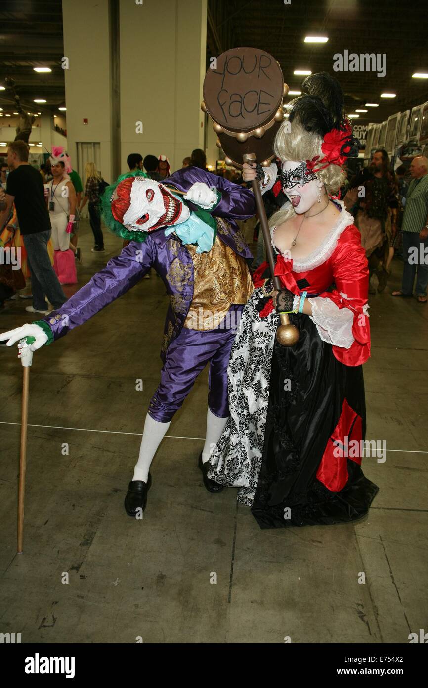 Salt Lake City, CA. 6th Sep, 2014. Fans dressed in 'The Joker' and Harley Quinn costumes in attendance for Salt Lake COMICON 2014 - SAT, Salt Palace Convention Center, Salt Lake City, CA September 6, 2014. Credit:  James Atoa/Everett Collection/Alamy Live News Stock Photo
