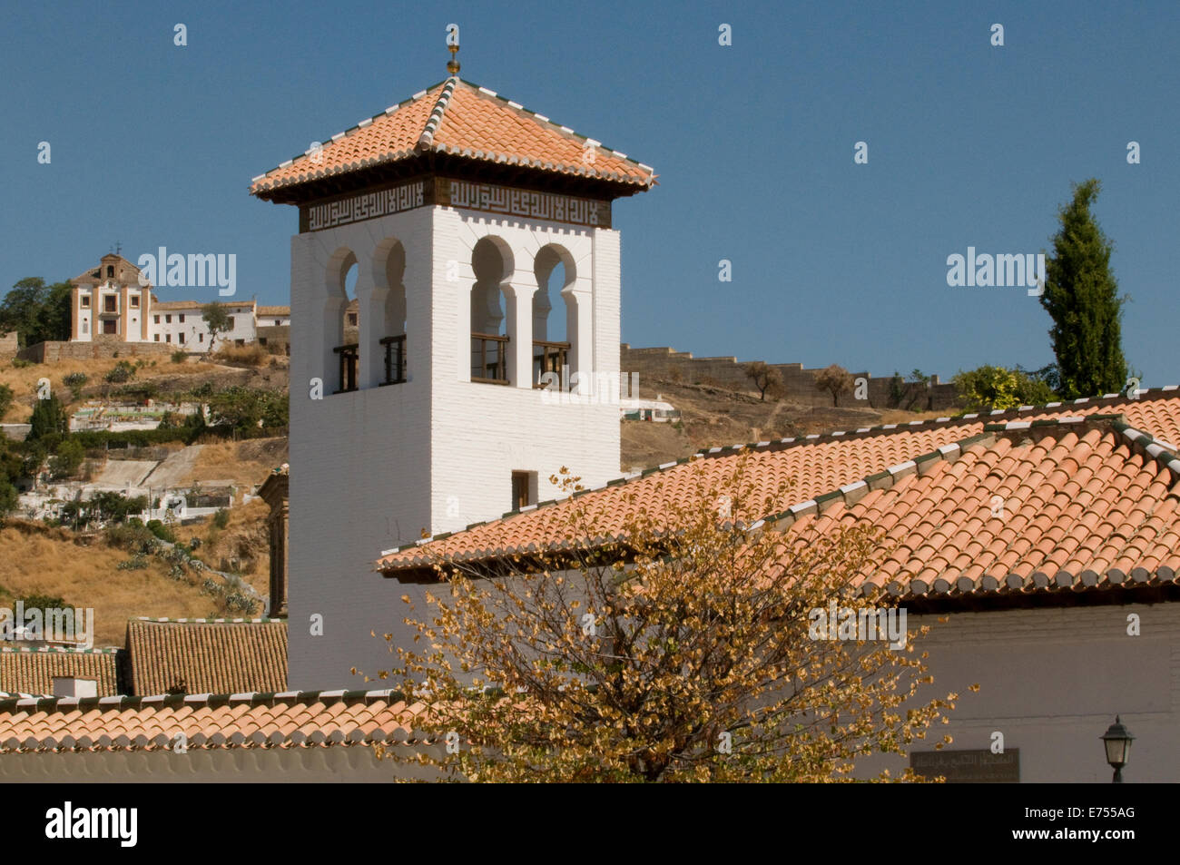 Moorish style architecture turret ceramic roof tiles hill view Granada Spain Stock Photo