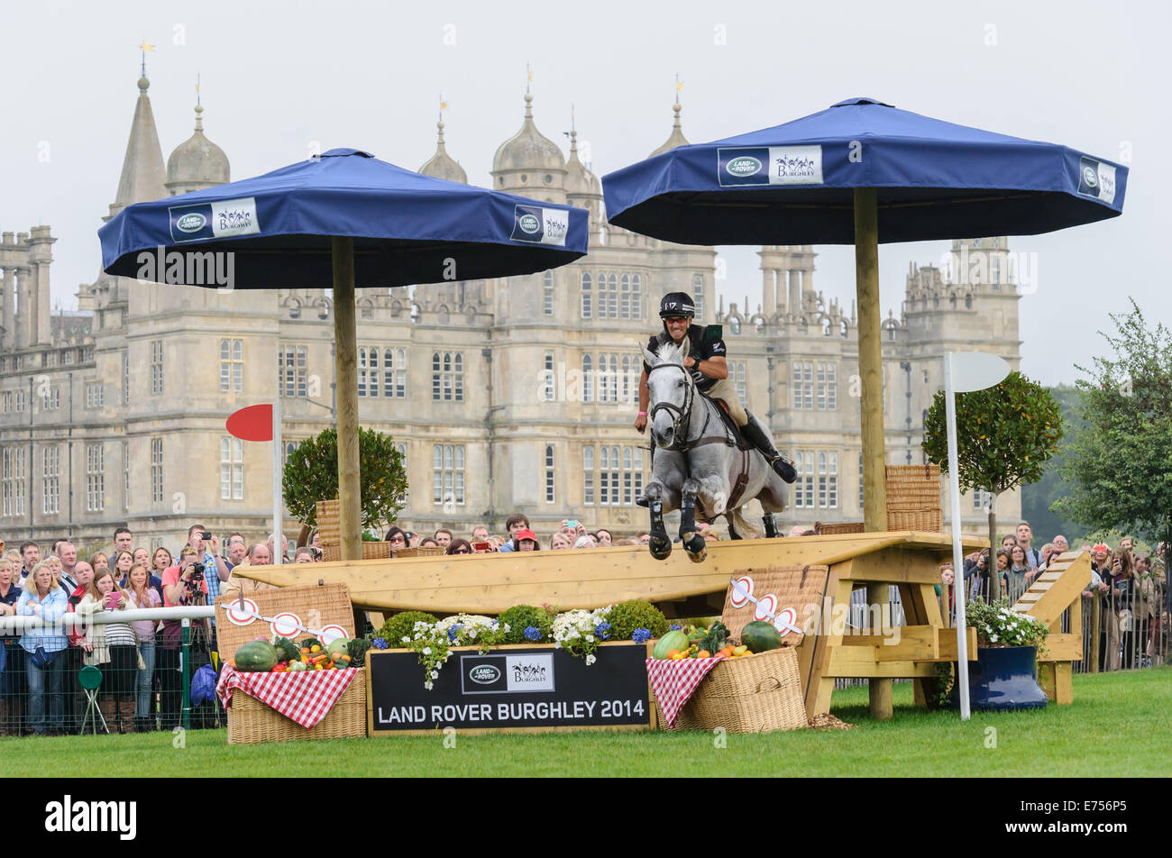 Andrew Nicholson and AVEBURY - Burghley House, Stamford, UK. 7th Sep, 2014. The Cross Country phase,  Land Rover Burghley Horse Trials, 6th September 2014. Credit:  Nico Morgan/Alamy Live News Stock Photo