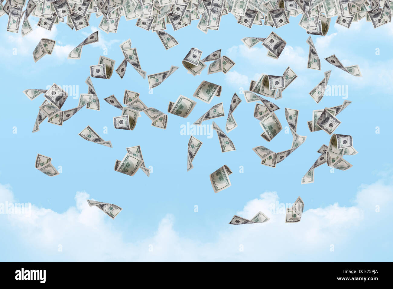 Dollar banknotes falling down on cloudy sky background Stock Photo - Alamy