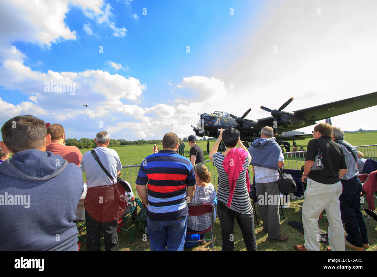 Lincolnshire, UK. 7th Sep, 2014. saw a spectacular public event and unique moment in aviation history at the Lincolnshire Aviation Heritage Centre, East Kirkby, Lincs PE23 4DE.  Media was invited to attend as the world’s only flying Lancaster Bombers (The RAF’s Lancaster “Thumper” and the Canadian Lancaster “Vera”) overflew Britain’s only other running Lancaster “Just Jane” as it taxied on the runway at the Lincs Aviation Heritage Centre.  11 IMAGES OF THE SHOW. Stock Photo