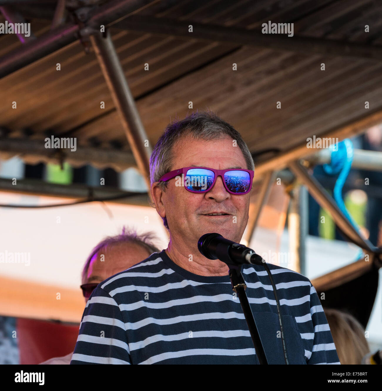 Lyme Regis, Dorset, UK. 6th September, 2014. Ian Gillan on stage at The Guitars  on the Beach event. Singing Smoke on the Water. Stock Photo