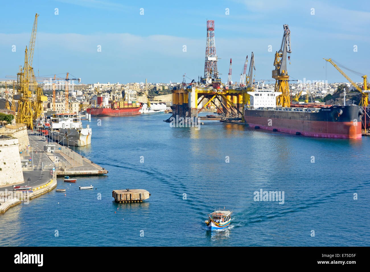 Port facilities and repair yards including the Transocean Amirante drilling rig platform Grand Harbour Valletta Malta Mediterranean Sea Europe Valetta Stock Photo