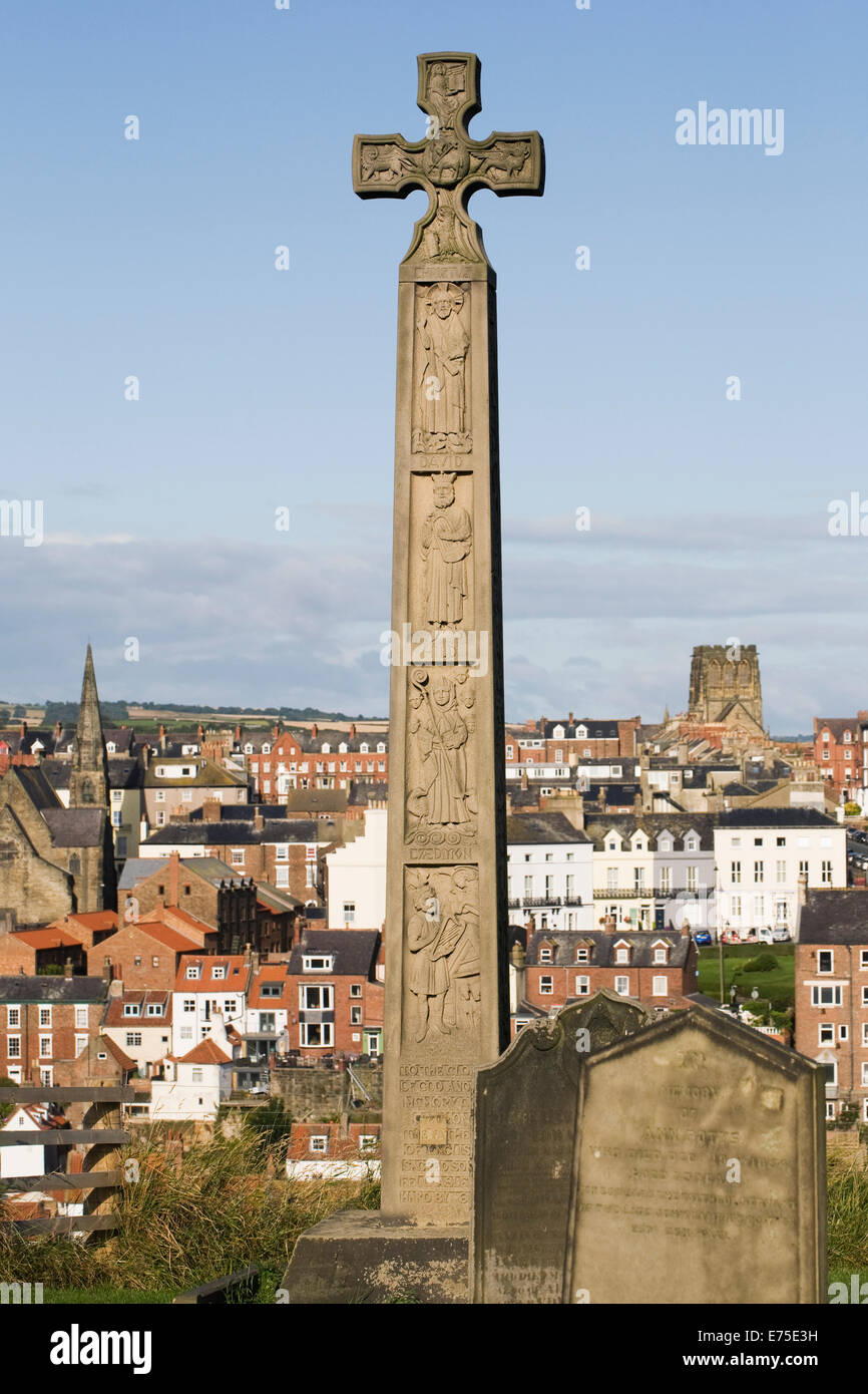Monument to Caedmon, Whitby in the grounds of St. Mary's Church. Stock Photo