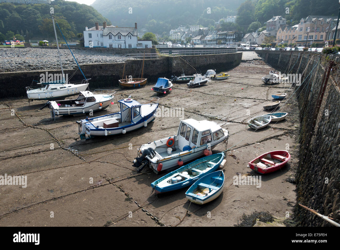Boats at anchor at low tide in Lynmouth habour North Devon UK Stock Photo