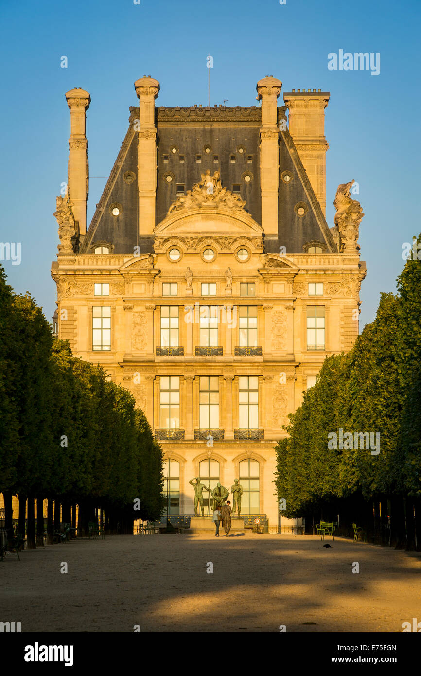 Setting sunlight over Pavillon de Flore of Musee du Louvre and Jardin des Tuileries, Paris France Stock Photo